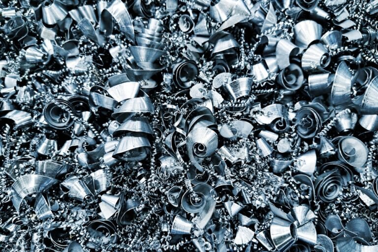 Blue,Toned,Metal,Shavings,Background.,Curled,Spiral,Chips,From,Machining